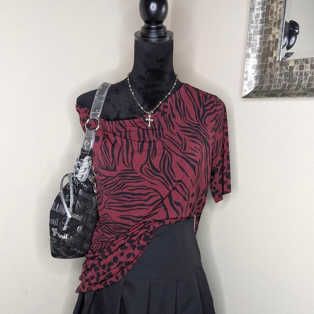 Burgundy and black animal print top large